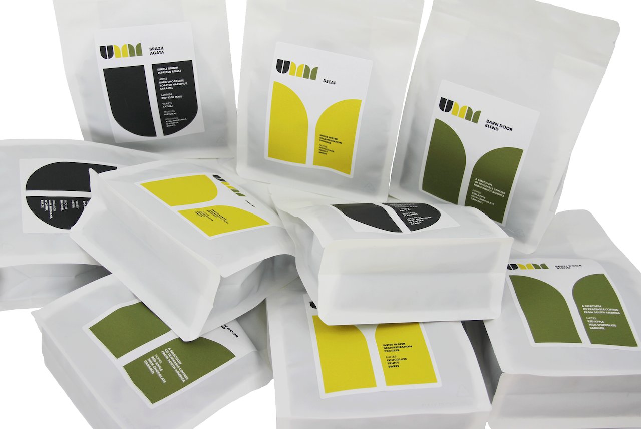 Umm Coffee collection — Agata, Decaf, and Barn Door Blend bags